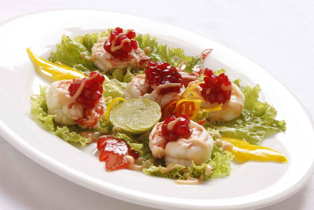 马杜赖遗产酒店 外观 照片 A salad of scallops