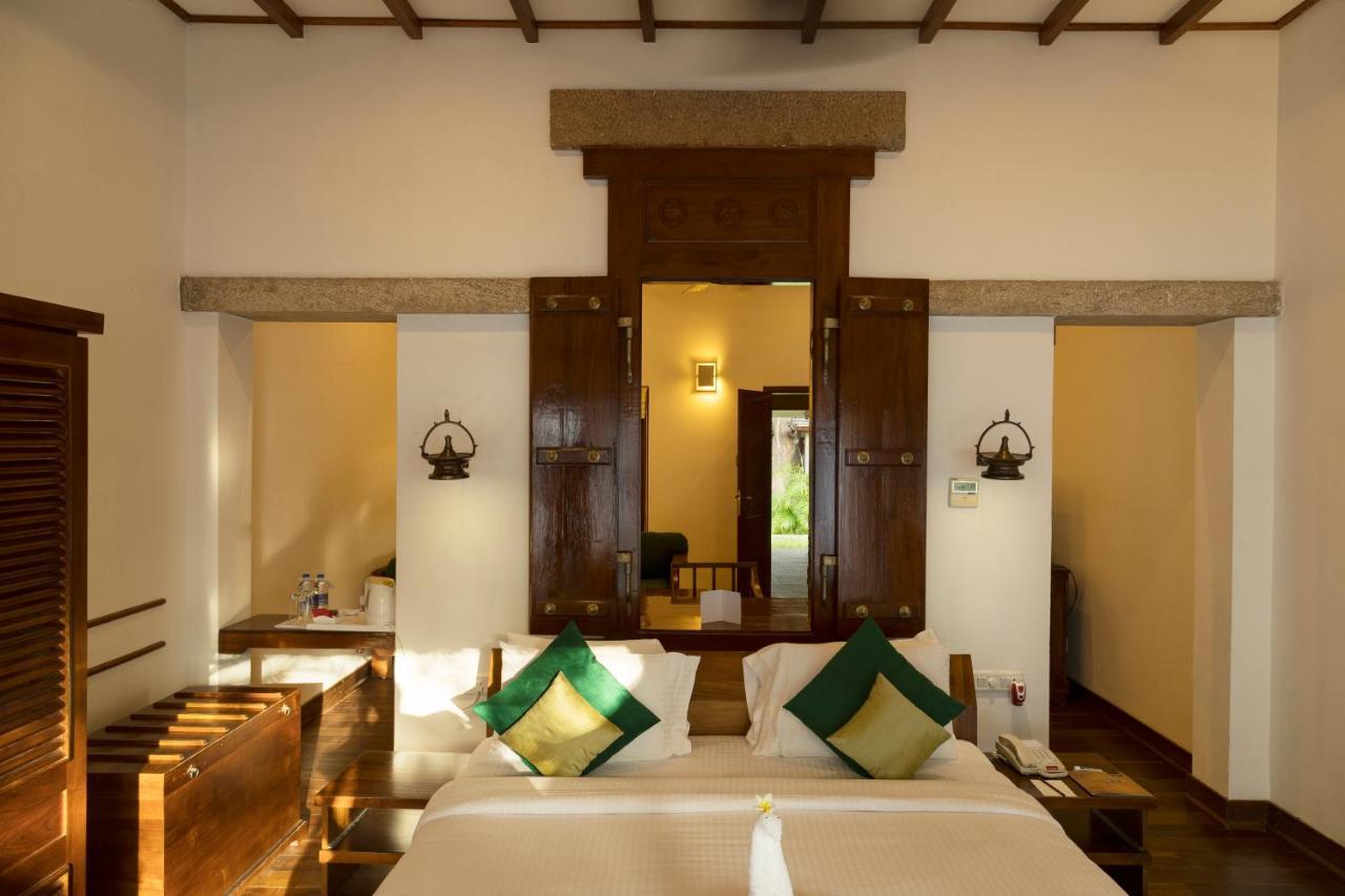 马杜赖遗产酒店 外观 照片 A bedroom at the resort
